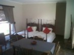 Bedroom with 3/4 quarter beds